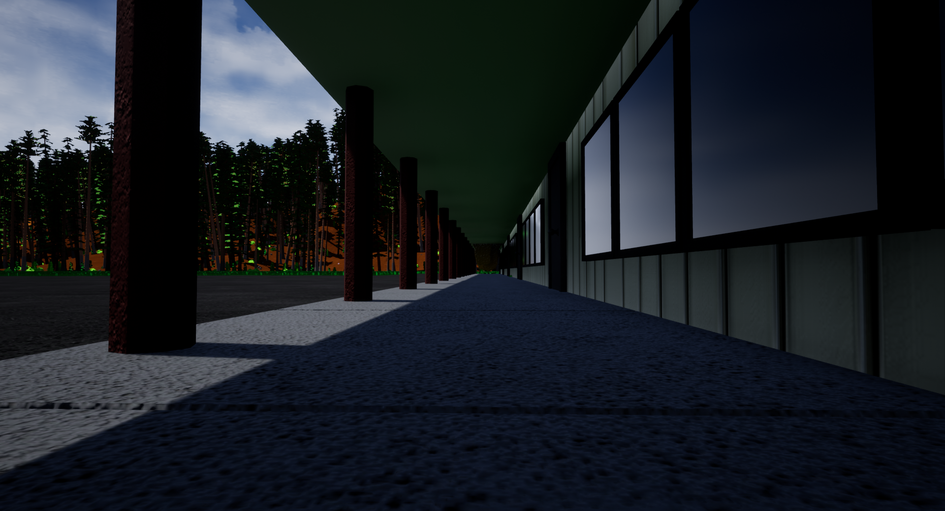 A long hallway covered by an awning