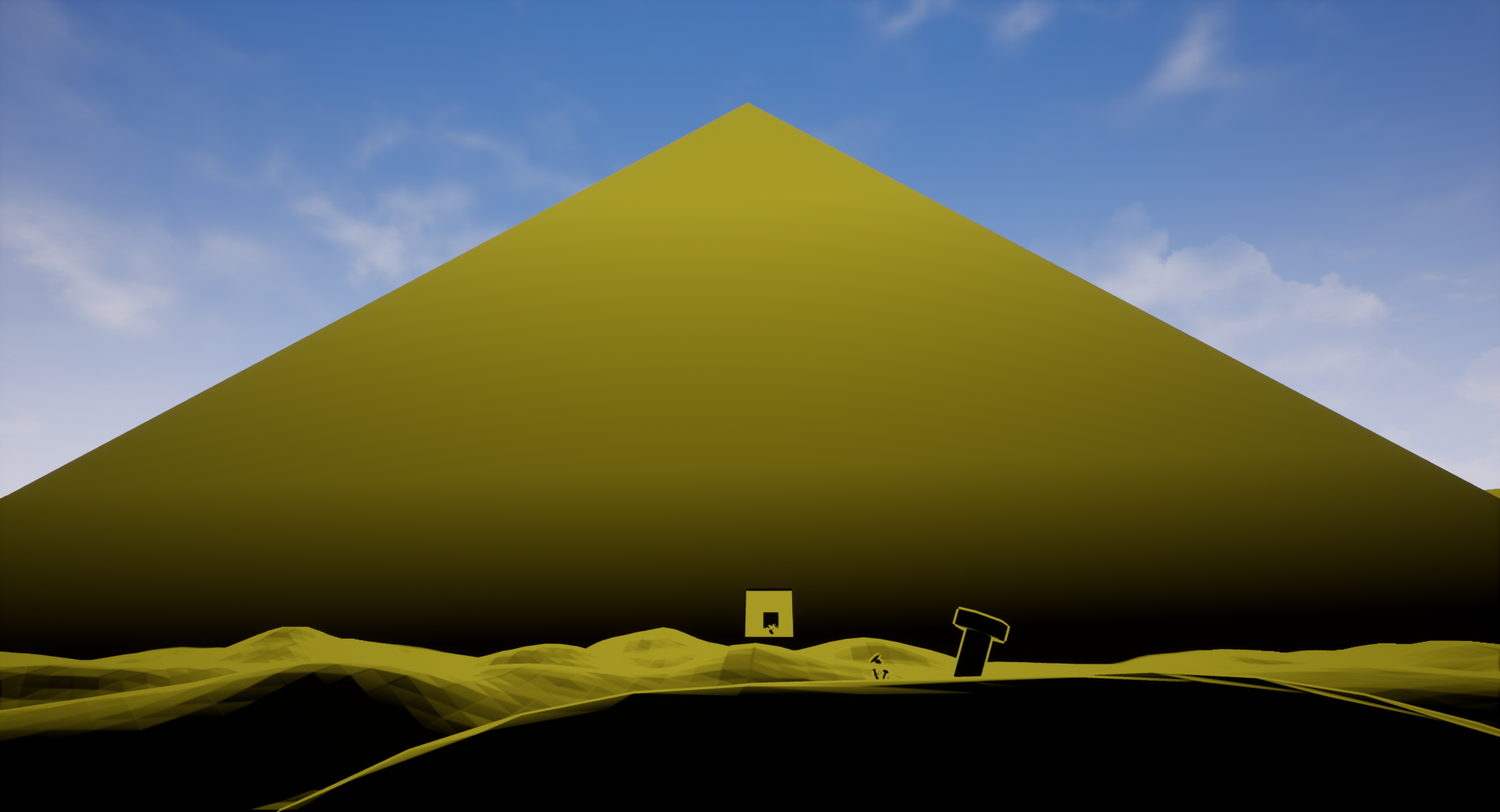A huge pyramid that takes up the width of the frame, an entrance is visible at the base